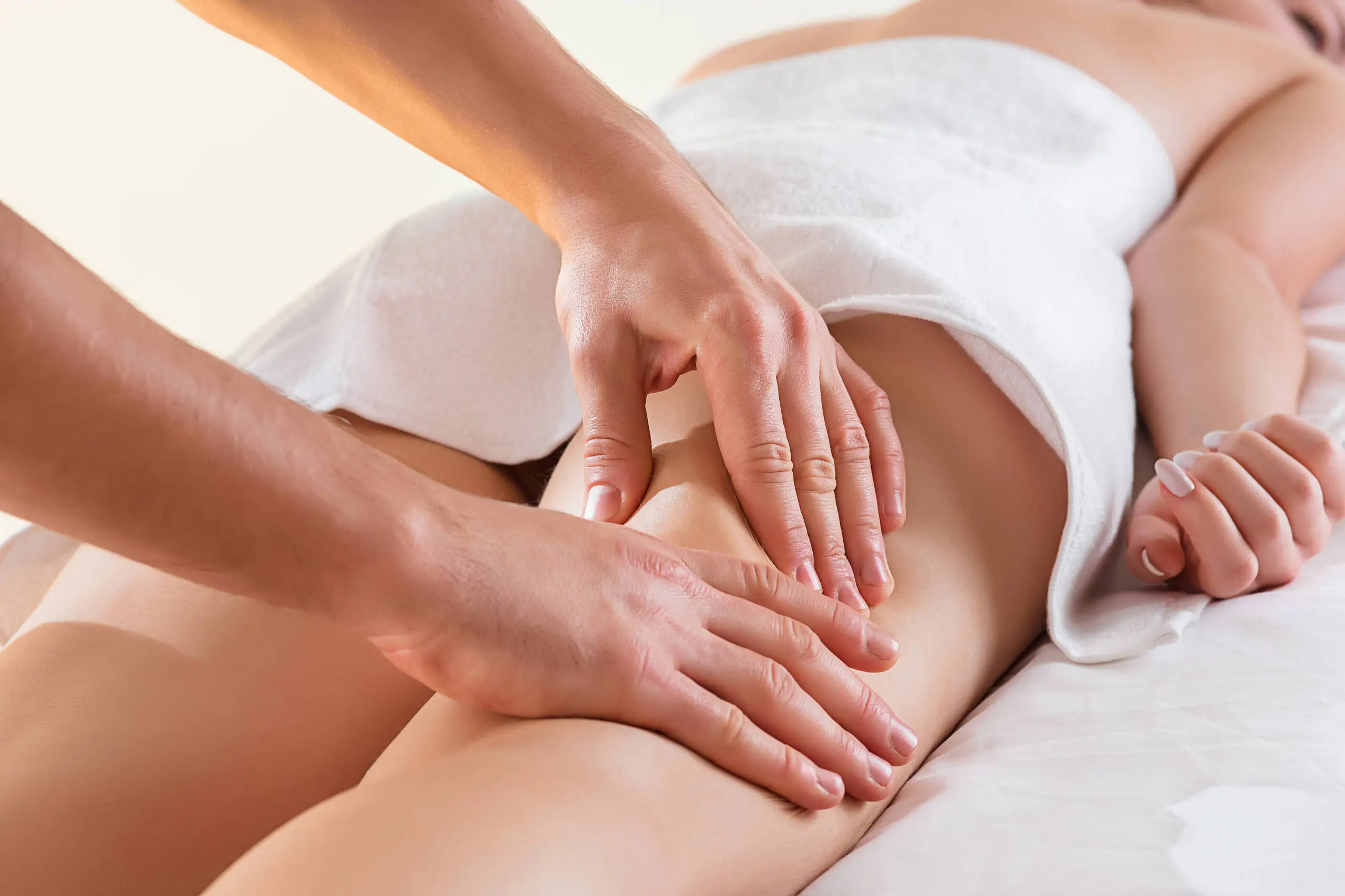 detail-hands-massaging-human-calf-muscle-scaled massage